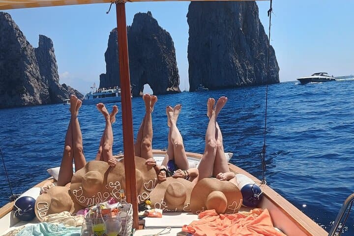 Capri Cave & Faraglioni Boat Tour: Swim, Snack, and Limoncello