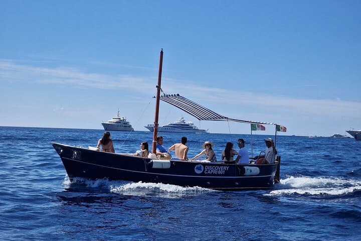Capri Cave & Faraglioni Boat Tour: Swim, Snack, and Limoncello photo 3