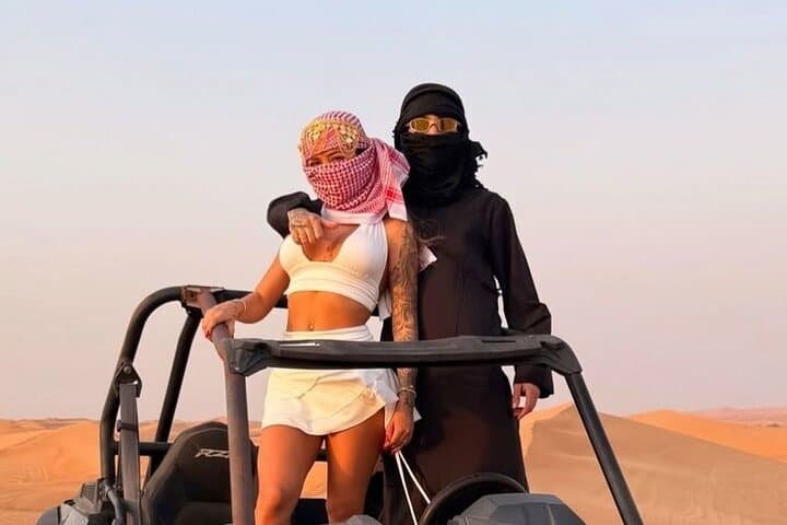 Sunset Desert Safari Dubai — Red Dunes, Camel Ride & BBQ Under the Stars