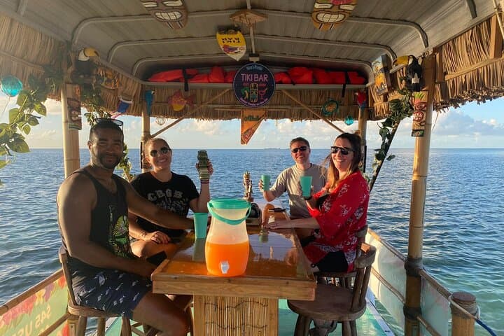 Private Tiki Boat Adventure in Caye Caulker — Snorkel, Sharks & Sunset Cruise photo 5