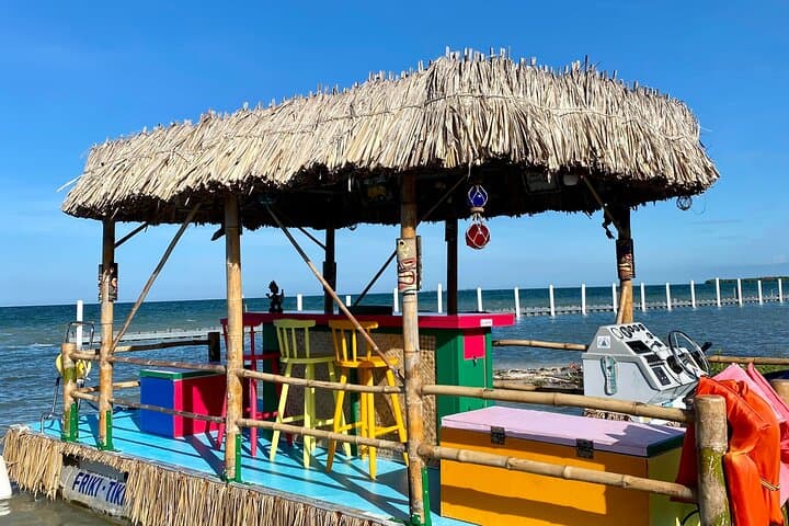 Private Tiki Boat Adventure in Caye Caulker — Snorkel, Sharks & Sunset Cruise photo 6