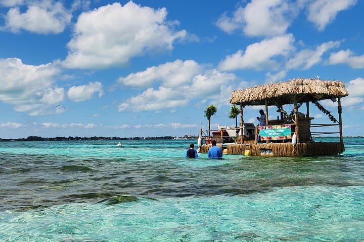 Private Tiki Boat Adventure in Caye Caulker — Snorkel, Sharks & Sunset Cruise photo 3