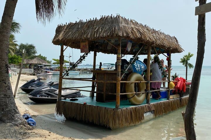 Private Tiki Boat Adventure in Caye Caulker — Snorkel, Sharks & Sunset Cruise