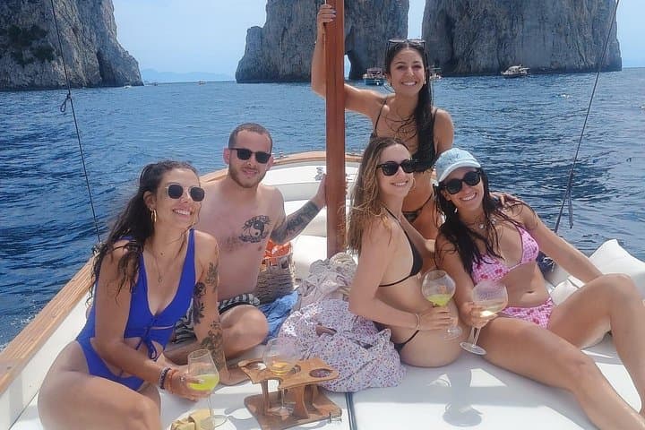 Capri Boat Tour: Faraglioni, Natural Arch & Spritz Cruise photo 4