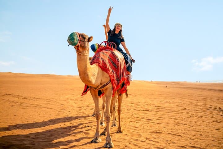 Half-Day Dubai Desert Safari in Lahbab: Dune Bashing, Camel Ride & Sandboarding photo 2