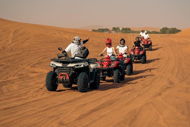 Red Dunes Adventure: Dubai Desert Safari with Quad Bike, Camel Ride & BBQ photo 1