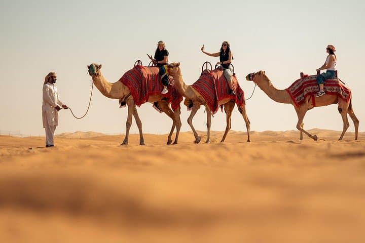 Red Dunes Adventure: Dubai Desert Safari with Quad Bike, Camel Ride & BBQ photo 4