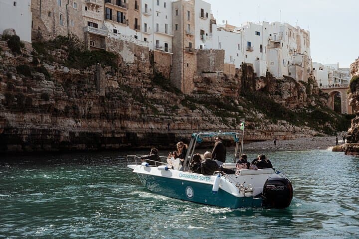 Polignano Between Waves and Clouds: Speedboat Caves and Parasailing Experience photo 3