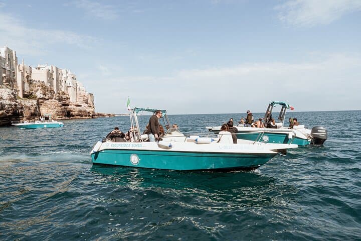 Polignano Between Waves and Clouds: Speedboat Caves and Parasailing Experience photo 4