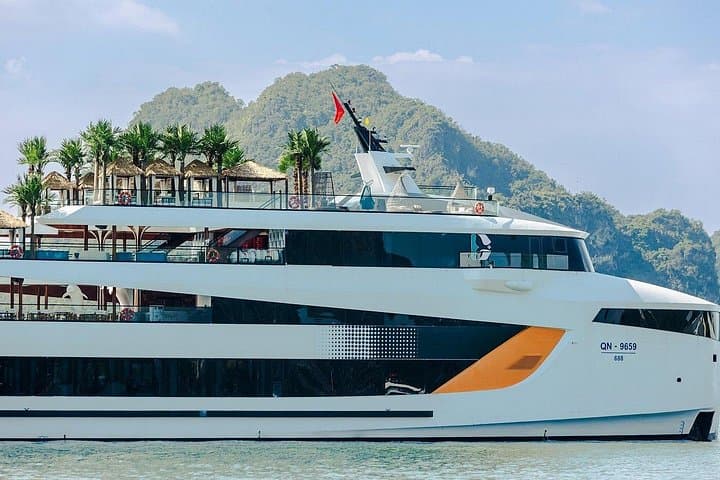 Luxury Dolphin Day Cruise in Ha Long Bay: Private Pool, Kayaks & Sunset Music photo 4