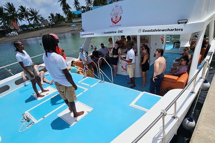 Half-Day Private Waterslide Catamaran Charter in St Kitts — Snorkel & Beach Stop photo 2