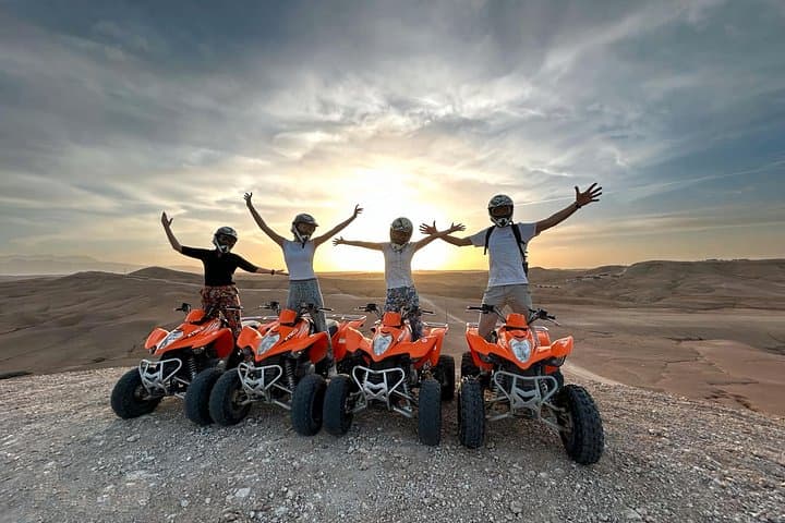 Sunset Quads and Campfire Tagines: Agafay Desert Quad Bike, Camel Ride & Dinner Show photo 3