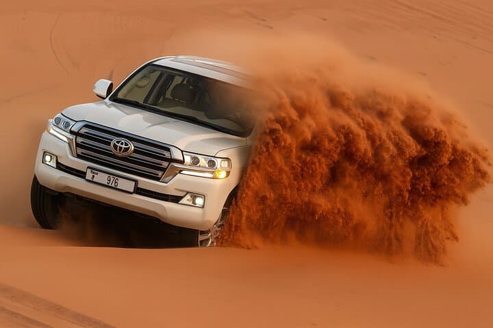 Dubai Red Dune Safari: Quad Biking, Camel Rides & BBQ Under the Stars