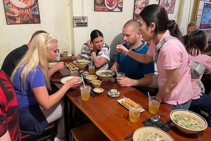 Saigon Night Scooter Street-Food Tour: Ride, Eat, Explore the Real City photo 4