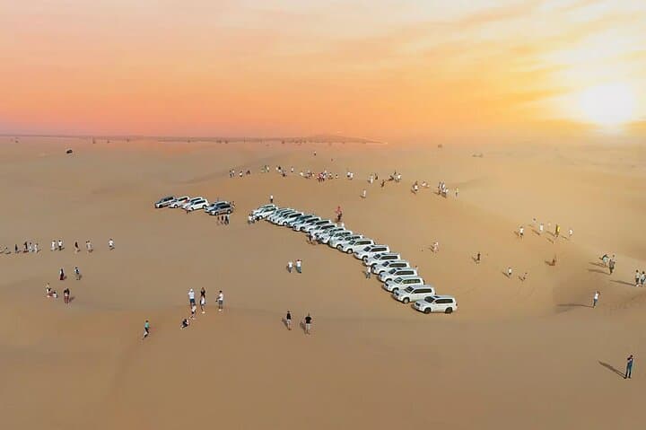 Sunset on the Red Dunes: Lahbab Desert Evening with Heritage Village