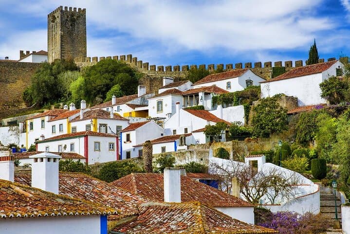 Lisbon Day Trip: Dinosaur Footprints, Mira de Aire Caves & Óbidos Medieval Walk photo 2