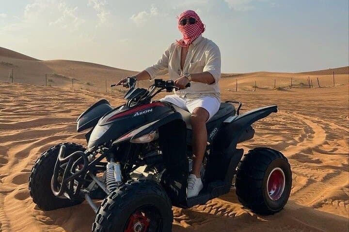 VIP Red Dunes Safari: Quad Biking, Camel Ride & Desert Dinner in Dubai photo 5