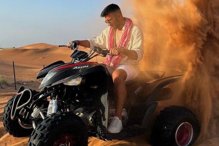 VIP Red Dunes Safari: Quad Biking, Camel Ride & Desert Dinner in Dubai