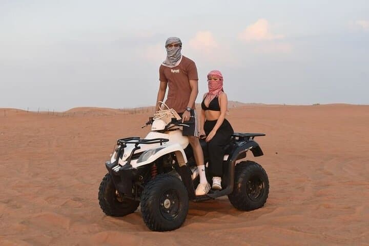 Sunset Red Dunes: Dubai Evening Desert Safari with Quad Bikes and Premium Camp
