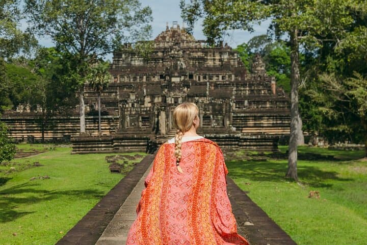 Private Half-Day Angkor Wat and Angkor Thom Tour — Smiling Faces and Jungle Roots photo 3