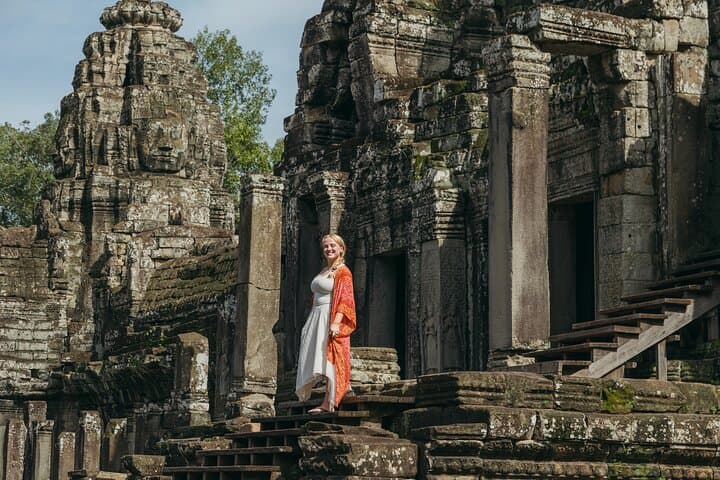 Private Half-Day Angkor Wat and Angkor Thom Tour — Smiling Faces and Jungle Roots photo 4