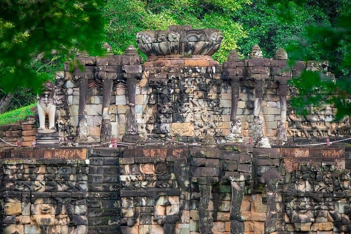 Private Half-Day Angkor Wat and Angkor Thom Tour — Smiling Faces and Jungle Roots photo 6