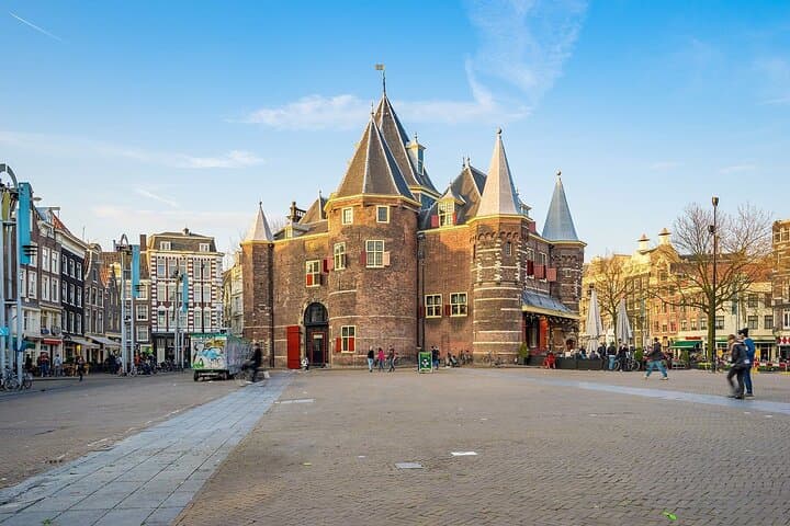 Essential Amsterdam Guided Walking Tour: Canals, Golden Age & Hidden Courtyards
