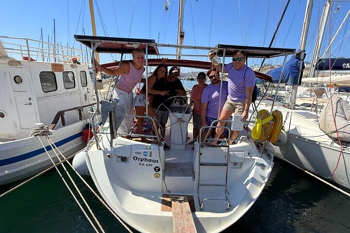 Private Santorini Sailing Day: Caldera Cruise, Snorkeling & Greek Feast photo 2