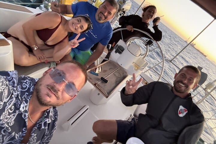 Private Santorini Sailing Day: Caldera Cruise, Snorkeling & Greek Feast photo 3