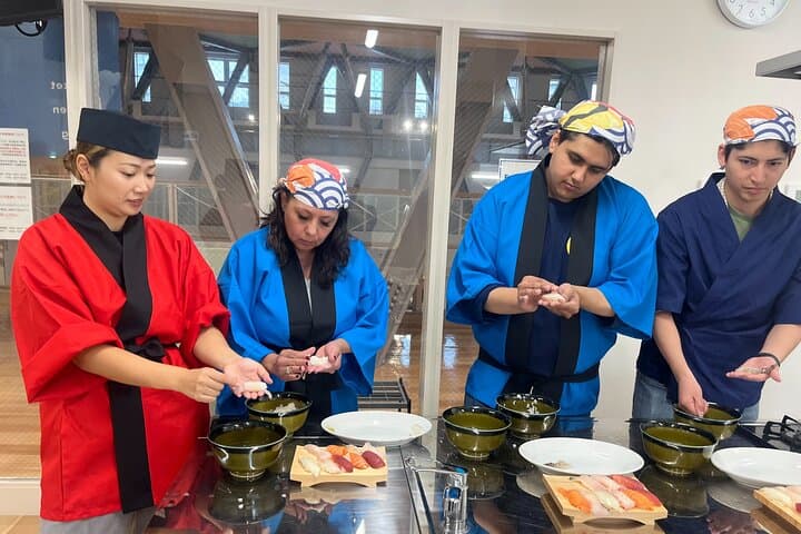 E-Bike Tour & Makishi Market Sushi Workshop — Naha City Cycling Experience