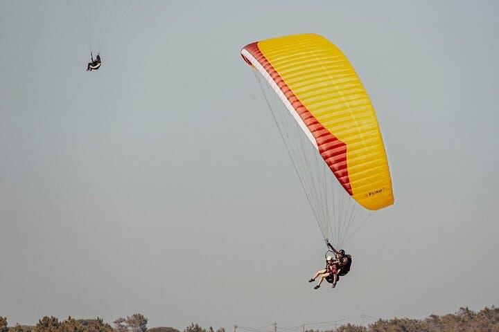 Tandem Paragliding Above Portugal's Coastline: São Martinho do Porto & Nazaré