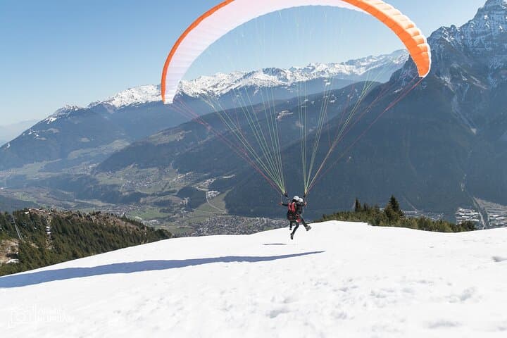 Tandem Paragliding in the Stubai Valley with World Champion Aaron Durogati photo 3