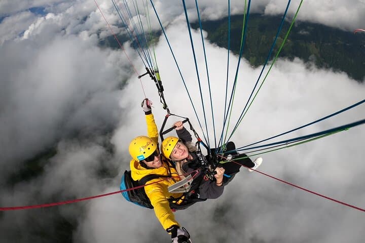 Tandem Paragliding in the Stubai Valley with World Champion Aaron Durogati photo 2