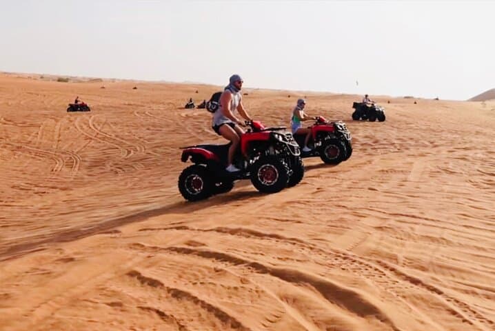 Red Dunes Dubai Desert Safari: Dune Bashing, Camel Ride & Sandboarding