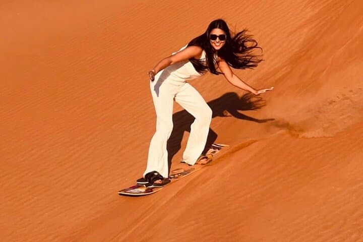 Red Dunes Dubai Desert Safari: Dune Bashing, Camel Ride & Sandboarding photo 3