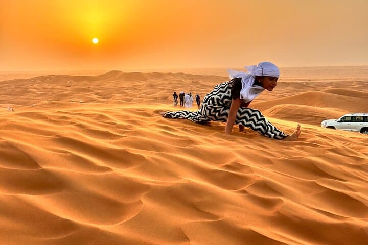 Red Dunes Dubai Desert Safari: Dune Bashing, Camel Ride & Sandboarding photo 6