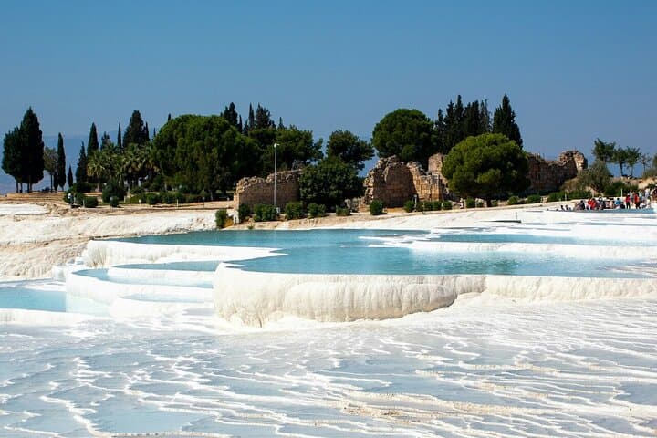 Explore Pamukkale's Travertines and Hierapolis: Small-Group Day Tour from Kusadasi