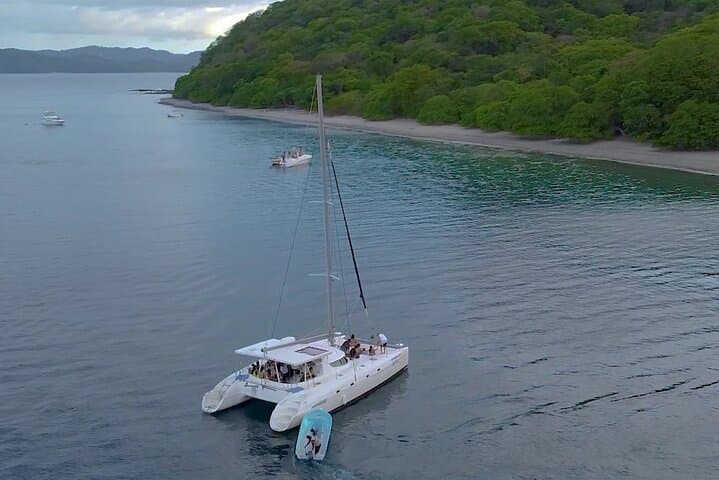 Sunset Catamaran Cruise from Playa Flamingo — Snorkel, Dolphins & Onboard Slide photo 2