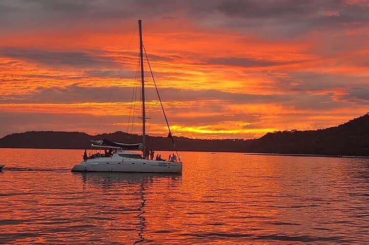 Sunset Catamaran Cruise from Playa Flamingo — Snorkel, Dolphins & Onboard Slide photo 4
