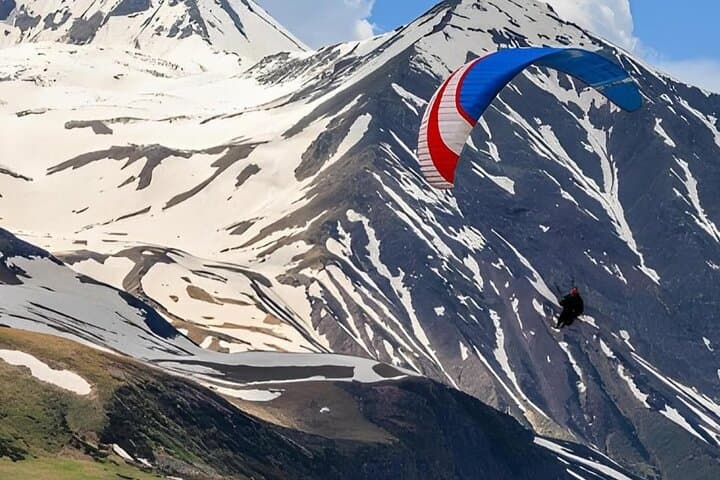Tandem Paragliding in Gudauri: Fly Over the Caucasus with a Certified Pilot photo 5