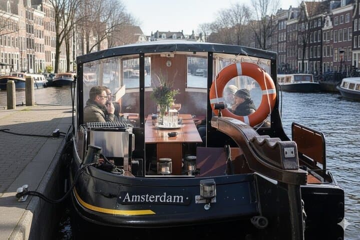 Smoke-Friendly Amsterdam Canal Cruise: 60-Minute Guided Boat with Drinks photo 6