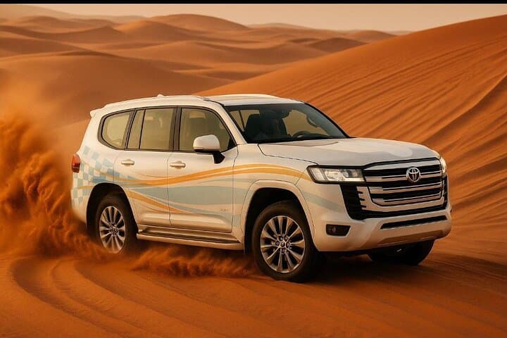Dubai Desert Safari with BBQ Dinner: Dune Bashing, Camel Rides & Evening Camp