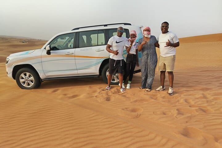 Dubai Desert Safari with BBQ Dinner: Dune Bashing, Camel Rides & Evening Camp photo 2