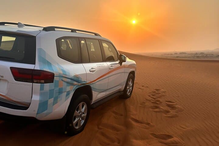 Dubai Desert Safari with BBQ Dinner: Dune Bashing, Camel Rides & Evening Camp photo 3