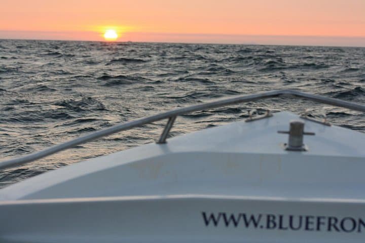 Sunset Boat Cruise to Cape Espichel — Small-Boat Evening Tour from Sesimbra photo 1