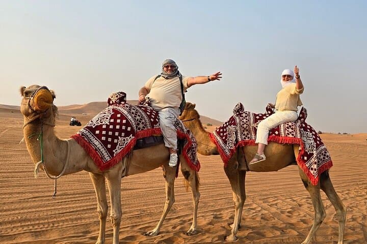 Morning Camel Trek & Sandboarding in Dubai’s Red Dunes — Sunrise Safari with Falcon Photos photo 3