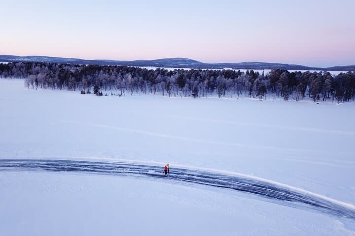 Skate the Wild: Ice Skating on Frozen Inari Lake, Lapland photo 3