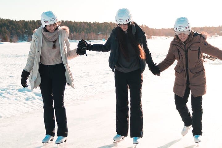 Skate the Wild: Ice Skating on Frozen Inari Lake, Lapland photo 2