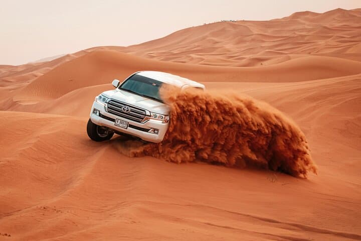 Dubai Desert Safari Premium: Dune Bashing, Quad Rides & VIP BBQ Experience photo 2