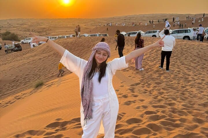 Abu Dhabi Desert Safari Evening: Dune Bashing, Camel Ride & Bedouin BBQ photo 6